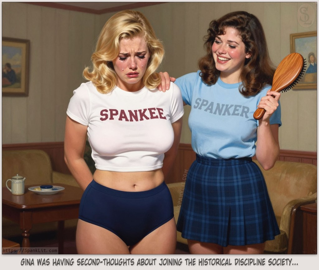 A beautiful tearful young woman (t-shirt reads "Spankee") stands beside her friend who is holding a hairbrush and wearing a t-shirt that reads "Spanker".